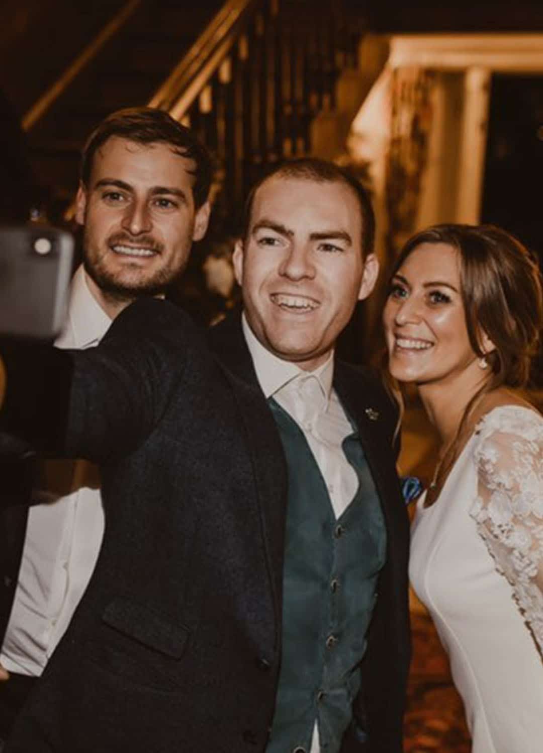 SAM FITTON wedding magician with bride and groom at iscoyd park wedding